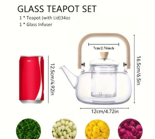 Detachable glass infuser being removed from teapot