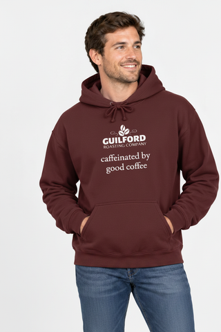 Male model wearing the Maroon Caffeinated by Good Coffee Hoodie