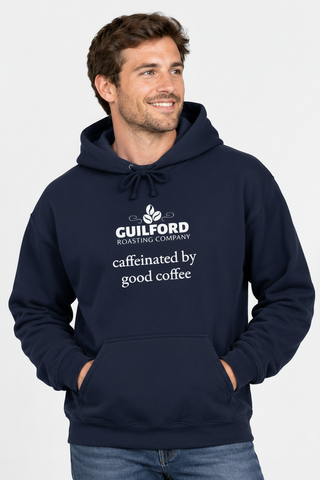 Male model wearing the Navy Caffeinated by Good Coffee Hoodie