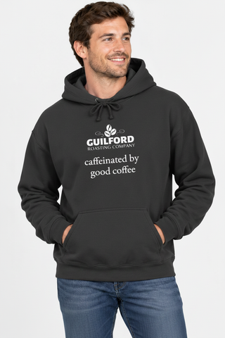 Male model wearing the Dark Heather Caffeinated by Good Coffee Hoodie