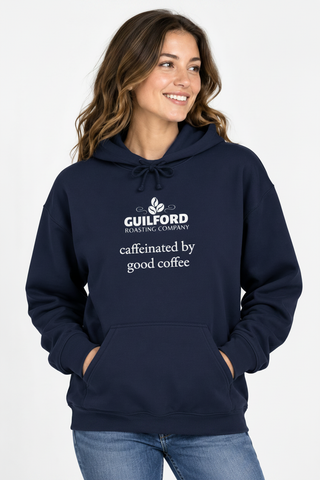 Female model wearing the Navy Caffeinated by Good Coffee Hoodie
